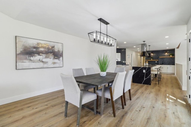 3612 Palomar Dr, Fallbrook, CA 92028 - dining room with light wood-style flooring, recessed lighting, and a chandelier