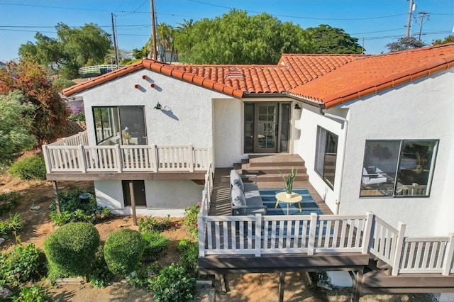 3612 Palomar Dr, Fallbrook, CA 92028 - rear view of property featuring stucco siding, a tiled roof, a deck, and stairs