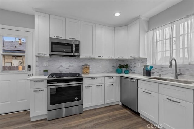 4612 W 161st St, Lawndale, CA 90260 - kitchen featuring stainless steel appliances, a sink, light countertops, white cabinetry, and recessed lighting