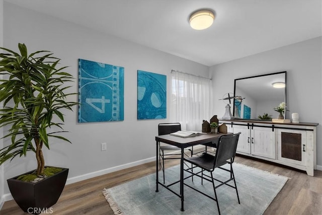 4612 W 161st St, Lawndale, CA 90260 - dining space featuring wood finished floors, baseboards, and a desk