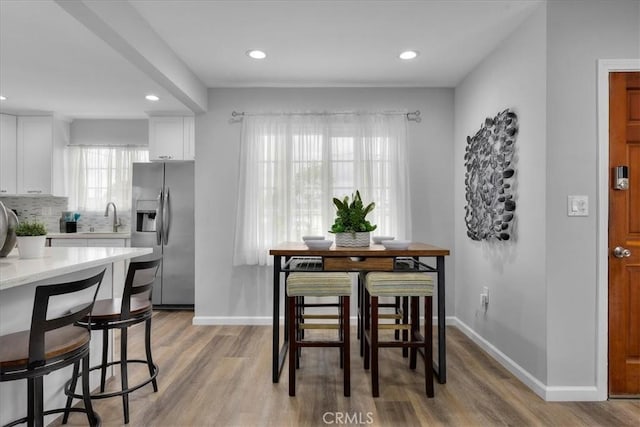 4612 W 161st St, Lawndale, CA 90260 - dining area featuring light wood-type flooring, baseboards, and recessed lighting