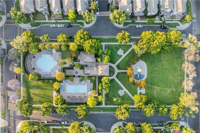 birds eye view of property with a residential view