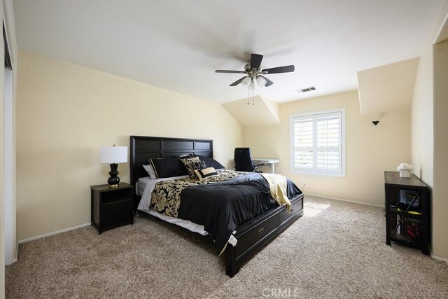 bedroom featuring visible vents, baseboards, a ceiling fan, and carpet flooring