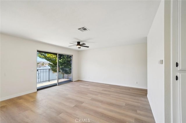 24319 Canyon Lake Dr Unit 10, Canyon Lake, CA 92587 - unfurnished room with baseboards, a ceiling fan, light wood-style floors, and visible vents
