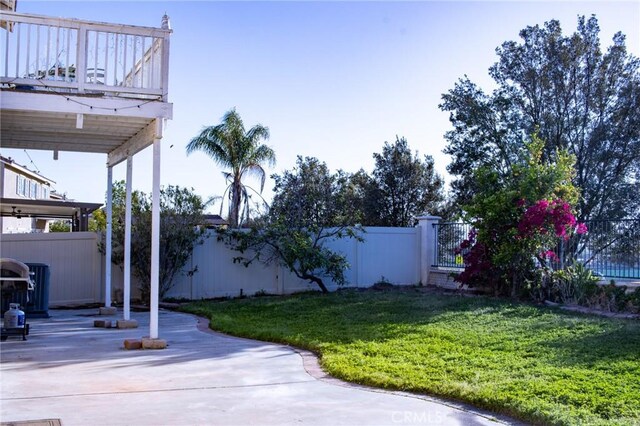 view of yard with a patio and a fenced backyard