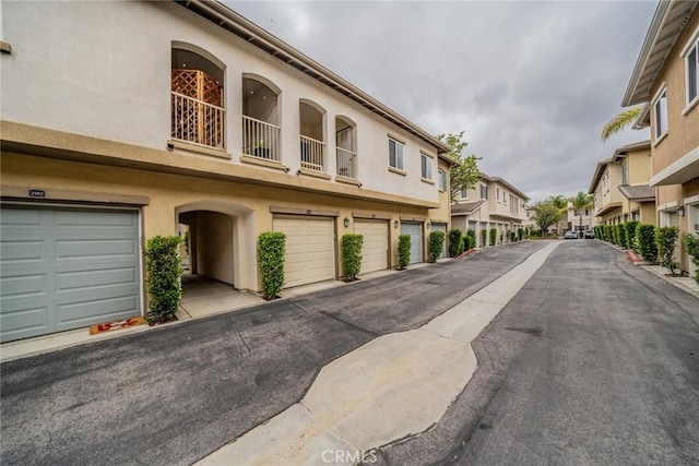 26396 Arboretum Way Unit 2906, Murrieta, CA 92563 - view of asphalt road with a residential view