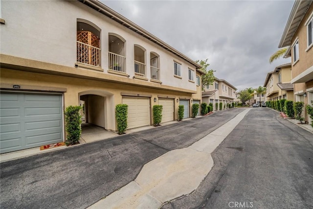 26396 Arboretum Way Unit 2906, Murrieta, CA 92563 - view of asphalt road featuring a residential view