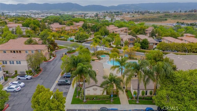 26396 Arboretum Way Unit 2906, Murrieta, CA 92563 - aerial perspective of suburban area featuring a mountainous background and a pool