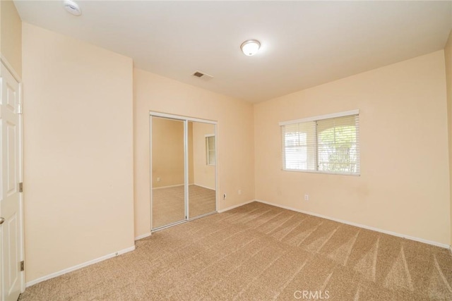 26396 Arboretum Way Unit 2906, Murrieta, CA 92563 - unfurnished bedroom featuring light carpet and a closet
