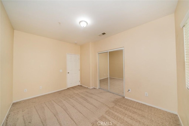 26396 Arboretum Way Unit 2906, Murrieta, CA 92563 - unfurnished bedroom featuring carpet floors, a closet, and baseboards