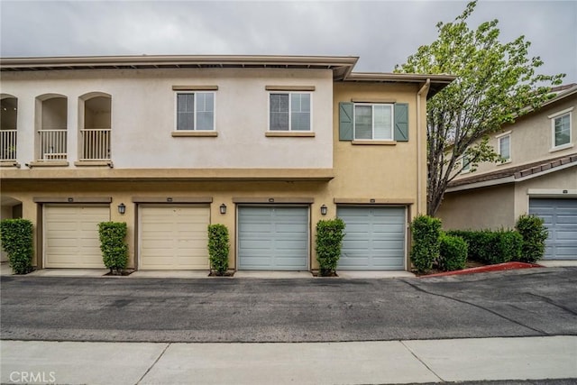 26396 Arboretum Way Unit 2906, Murrieta, CA 92563 - multi unit property with stucco siding and a garage