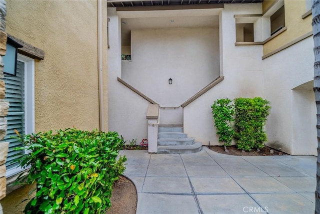 26396 Arboretum Way Unit 2906, Murrieta, CA 92563 - entrance to property with stucco siding