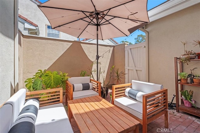 view of patio / terrace with fence