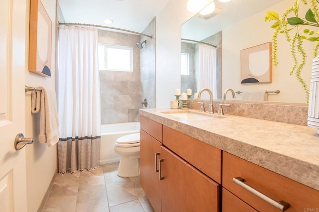 full bathroom with vanity, toilet, tile patterned flooring, and shower / bath combo