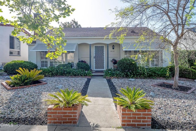 1404 Sycamore Ave, Glendale, CA 91201 - view of front of house with stucco siding and a shingled roof