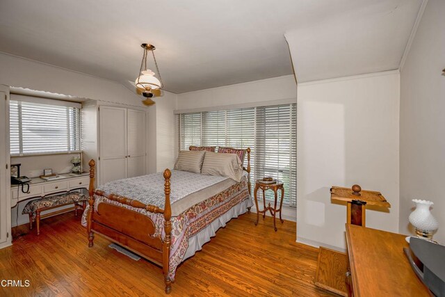 1404 Sycamore Ave, Glendale, CA 91201 - bedroom with wood finished floors, multiple windows, and crown molding