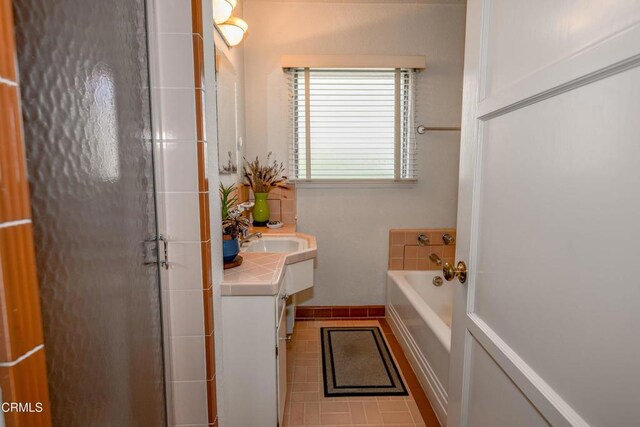1404 Sycamore Ave, Glendale, CA 91201 - full bath featuring vanity, a bath, tile patterned floors, and a shower with shower door