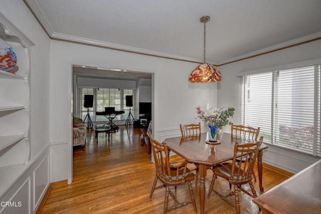 1404 Sycamore Ave, Glendale, CA 91201 - dining room with ornamental molding, light wood-style floors, and wainscoting