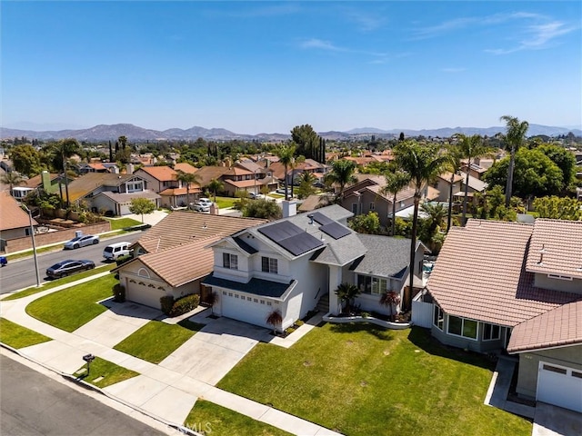 bird's eye view featuring a mountain view and a residential view