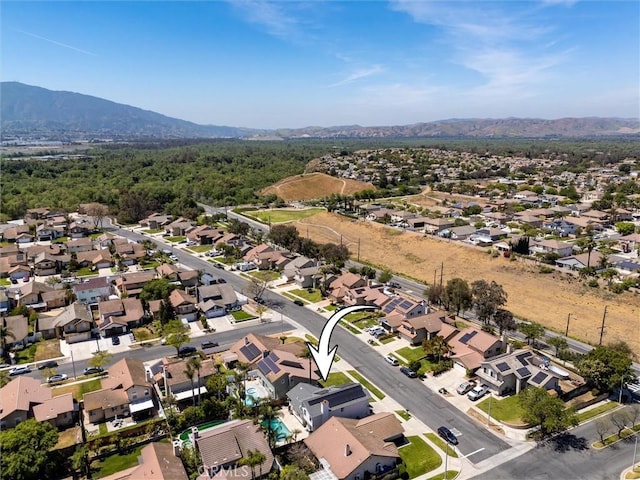 bird's eye view with a residential view and a mountain view