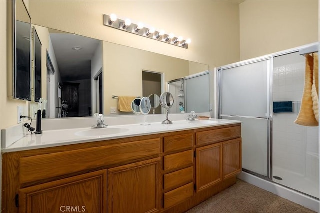 25714 Sunnyvale Ct, Menifee, CA 92584 - bathroom featuring double vanity, a shower stall, and a sink