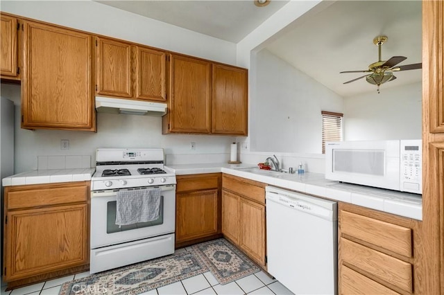 25714 Sunnyvale Ct, Menifee, CA 92584 - kitchen featuring a sink, white appliances, a ceiling fan, lofted ceiling, and under cabinet range hood