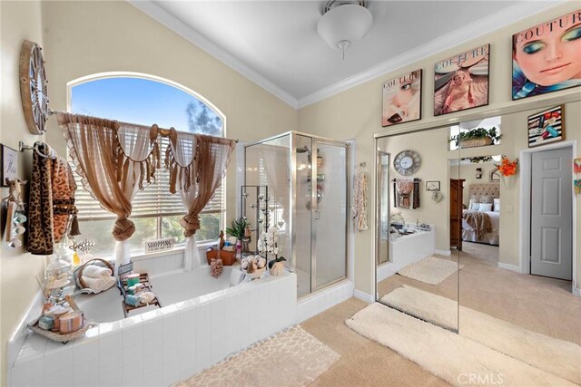 ensuite bathroom with a garden tub, a shower stall, ensuite bathroom, and crown molding