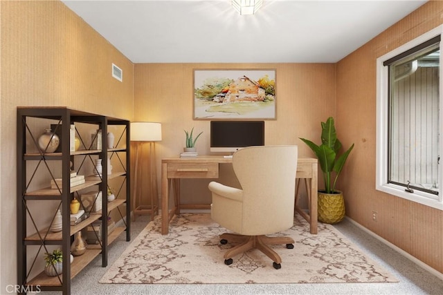 office with carpet floors, visible vents, and baseboards