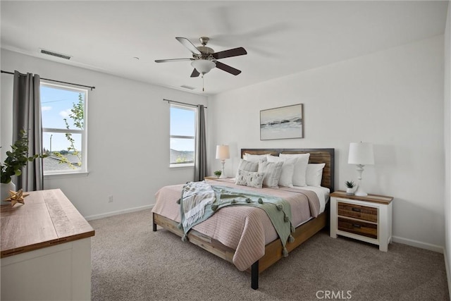 2991 Longwood Dr, Chico, CA 95928 - carpeted bedroom with visible vents, a ceiling fan, and baseboards