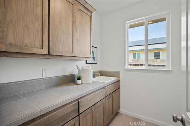 2991 Longwood Dr, Chico, CA 95928 - interior space featuring baseboards, a sink, and light tile patterned floors