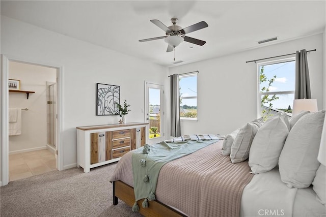 2991 Longwood Dr, Chico, CA 95928 - bedroom with access to outside, a ceiling fan, baseboards, ensuite bathroom, and visible vents