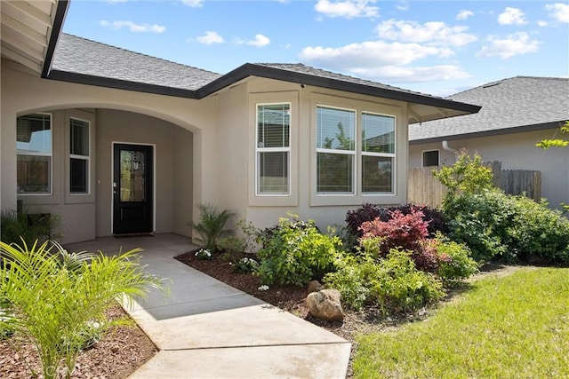 2991 Longwood Dr, Chico, CA 95928 - property entrance with fence, a shingled roof, and stucco siding