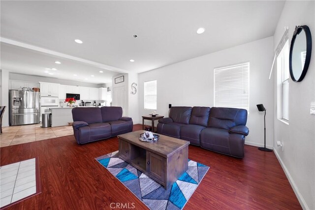 29444 Siderite Cir, Menifee, CA 92584 - living room featuring baseboards, recessed lighting, and light wood finished floors