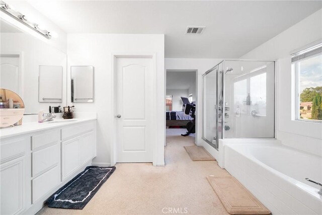 29444 Siderite Cir, Menifee, CA 92584 - full bath with connected bathroom, vanity, a shower stall, visible vents, and a garden tub