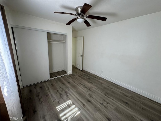 3100 Garnet Ln, Fullerton, CA 92831 - unfurnished bedroom featuring baseboards, a closet, a ceiling fan, and wood finished floors