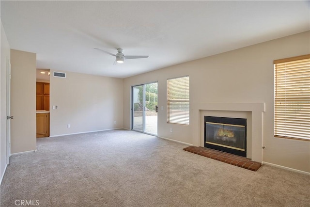 32000 Corte Sagunto, Temecula, CA 92592 - unfurnished living room with baseboards, ceiling fan, carpet, and visible vents