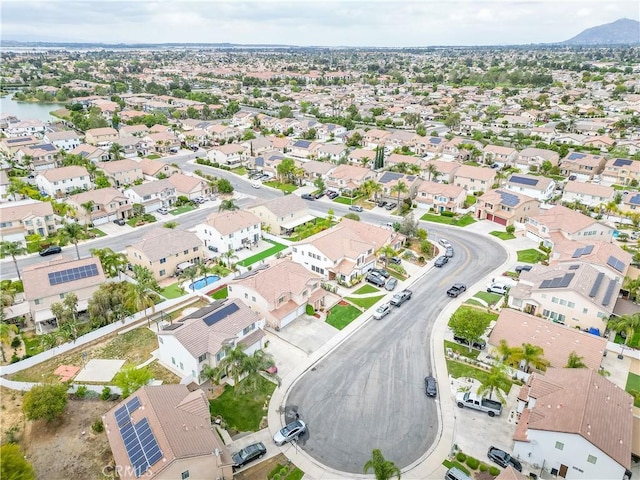 drone / aerial view with a residential view and a mountain view