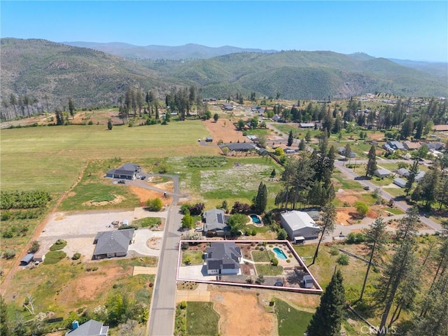 bird's eye view with a rural view and a mountain view