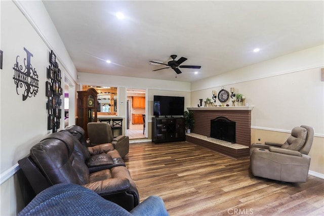 2812 Sunnywood Dr, Fullerton, CA 92835 - living area featuring a ceiling fan, wood finished floors, baseboards, a brick fireplace, and recessed lighting