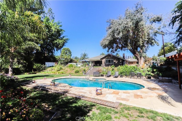 2812 Sunnywood Dr, Fullerton, CA 92835 - view of pool featuring stairway, a patio, and a pool with connected hot tub