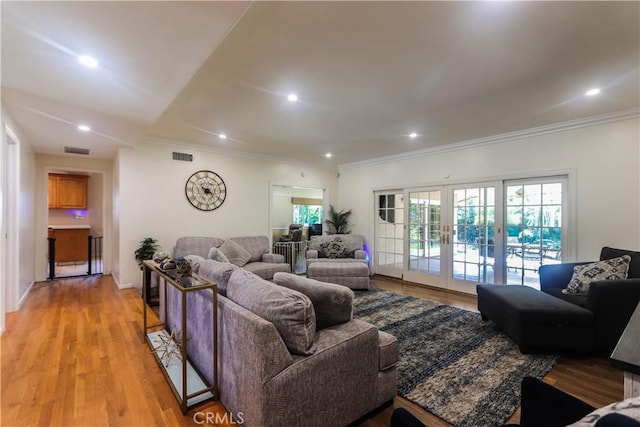 2812 Sunnywood Dr, Fullerton, CA 92835 - living room with visible vents, crown molding, a wealth of natural light, and french doors