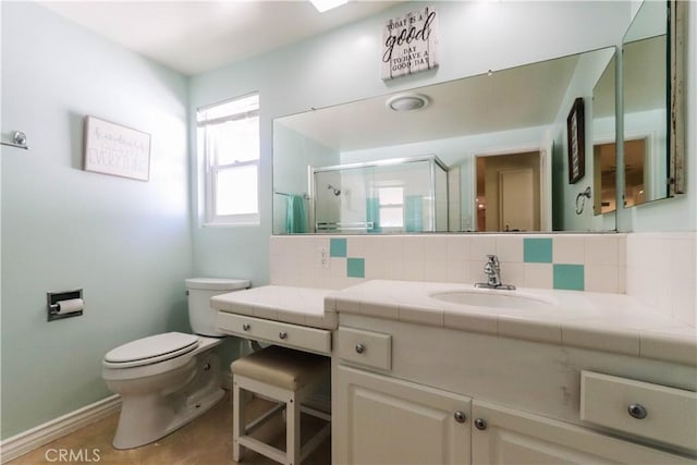 2812 Sunnywood Dr, Fullerton, CA 92835 - full bathroom featuring toilet, tasteful backsplash, a stall shower, vanity, and baseboards