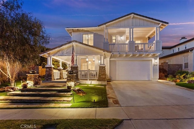1711 Colina Terrestre, San Clemente, CA 92673 - view of front of house featuring board and batten siding, a porch, concrete driveway, and a garage
