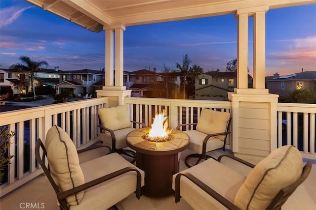 1711 Colina Terrestre, San Clemente, CA 92673 - balcony at dusk featuring an outdoor fire pit and a residential view