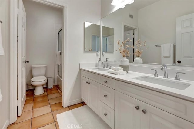 1711 Colina Terrestre, San Clemente, CA 92673 - full bathroom featuring double vanity, enclosed tub / shower combo, and tile patterned flooring