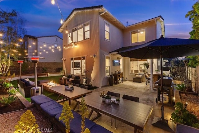 1711 Colina Terrestre, San Clemente, CA 92673 - rear view of property featuring an outdoor living space with a fire pit, stucco siding, a patio, and outdoor dining space