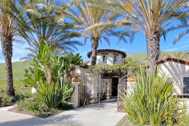 1711 Colina Terrestre, San Clemente, CA 92673 - mediterranean / spanish home featuring a gate, stucco siding, and a tiled roof