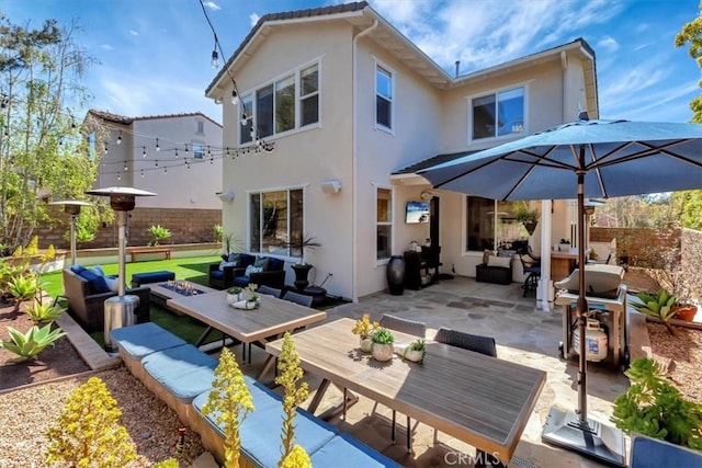 1711 Colina Terrestre, San Clemente, CA 92673 - back of house featuring an outdoor living space, stucco siding, a patio, and outdoor dining area