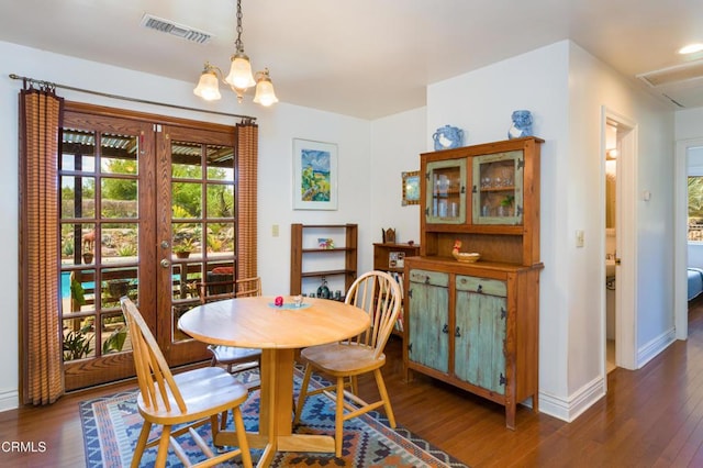 1526 Grand Ave, Fillmore, CA 93015 - dining area featuring wood finished floors, a chandelier, and french doors