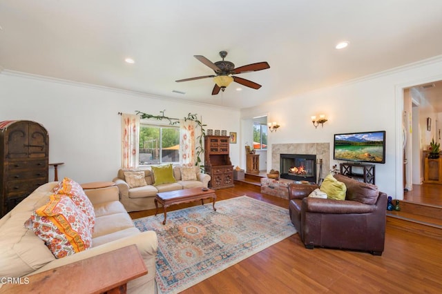 1526 Grand Ave, Fillmore, CA 93015 - living area with a fireplace, a ceiling fan, wood finished floors, ornamental molding, and recessed lighting